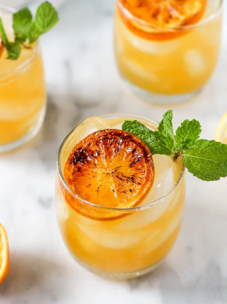 boozy clementine lemonade with brûléed citrus & mint