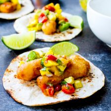 Beer Battered Fish Tacos With Mango Avocado Salsa Spicy Ranch Drizzle