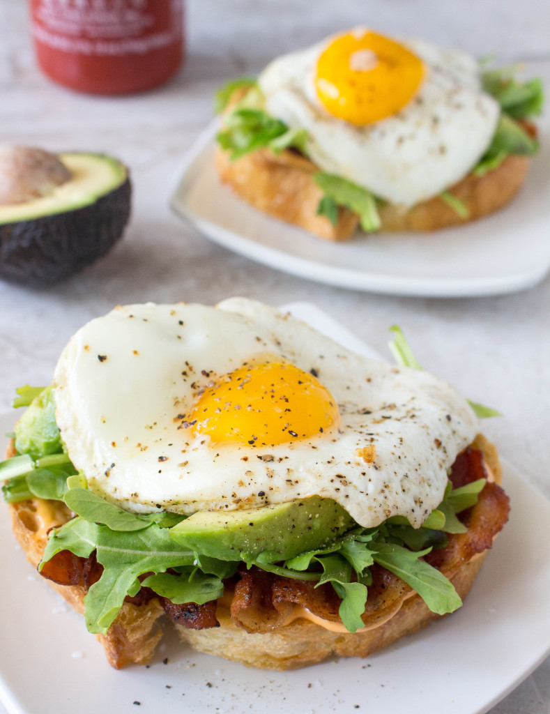 Open-Face Egg Sandwiches with Bacon, Avocado, & Sriracha Aioli