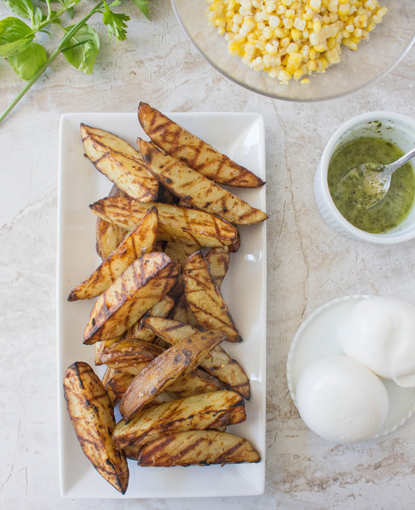 Grilled Garlic-Herb Potato Wedges with Corn, Pesto, & Burrata