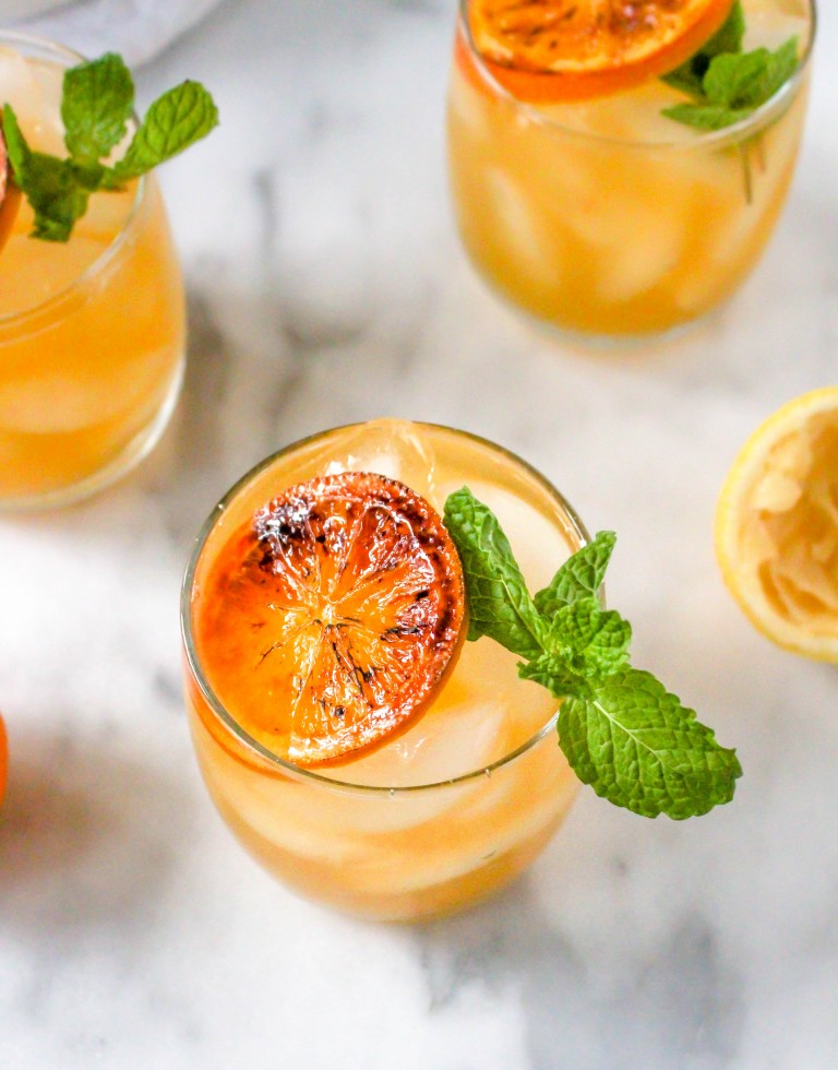 Boozy Clementine Lemonade with Brûléed Citrus & Mint - Yes to Yolks