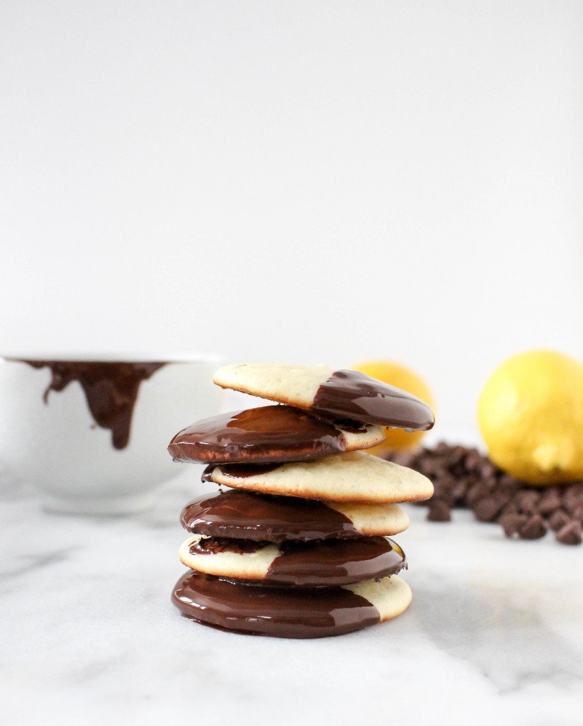 Lemon Truffle Cookies! Lemon cookies dunked in luxurious dark chocolate - the perfect little treat for your Valentine! | @yestoyolks.com