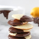 Lemon Truffle Cookies! Lemon cookies dunked in luxurious dark chocolate - the perfect little treat for your Valentine! | @yestoyolks.com