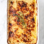 Roasted Garlic & Gouda Potato Gratin | yestoyolks.com