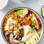 Cheddar Rice Bowls with Marinated Flank Steak, Corn, & Chipotle Drizzle | yestoyolks.com