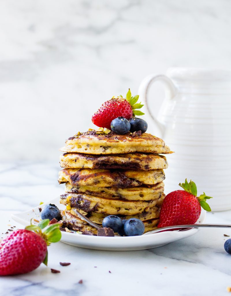 Dark Chocolate & Pistachio Pancakes with Fresh Berry Syrup | yestoyolks.com