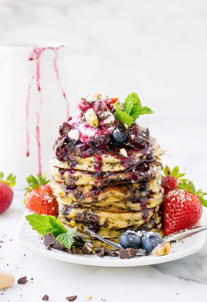 Dark Chocolate & Pistachio Pancakes with Fresh Berry Syrup | yestoyolks.com