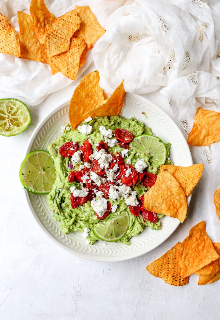 Guacamole with Goat Cheese, Roasted Tomatoes, & Pistachios