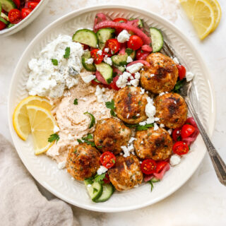 Spiced Chicken Meatball Bowls with Whipped Feta & Tzatziki