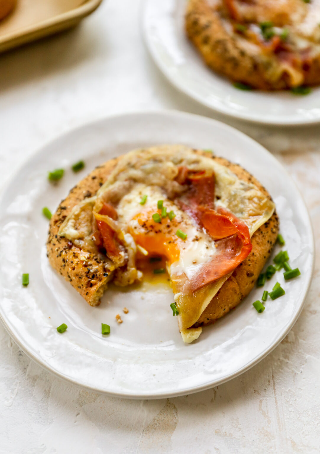 Egg in a Bagel Hole with Cheese & Prosciutto - Yes to Yolks